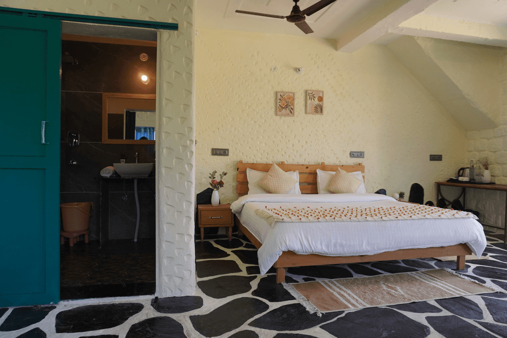 Bed, side tables and stone-patterned floor