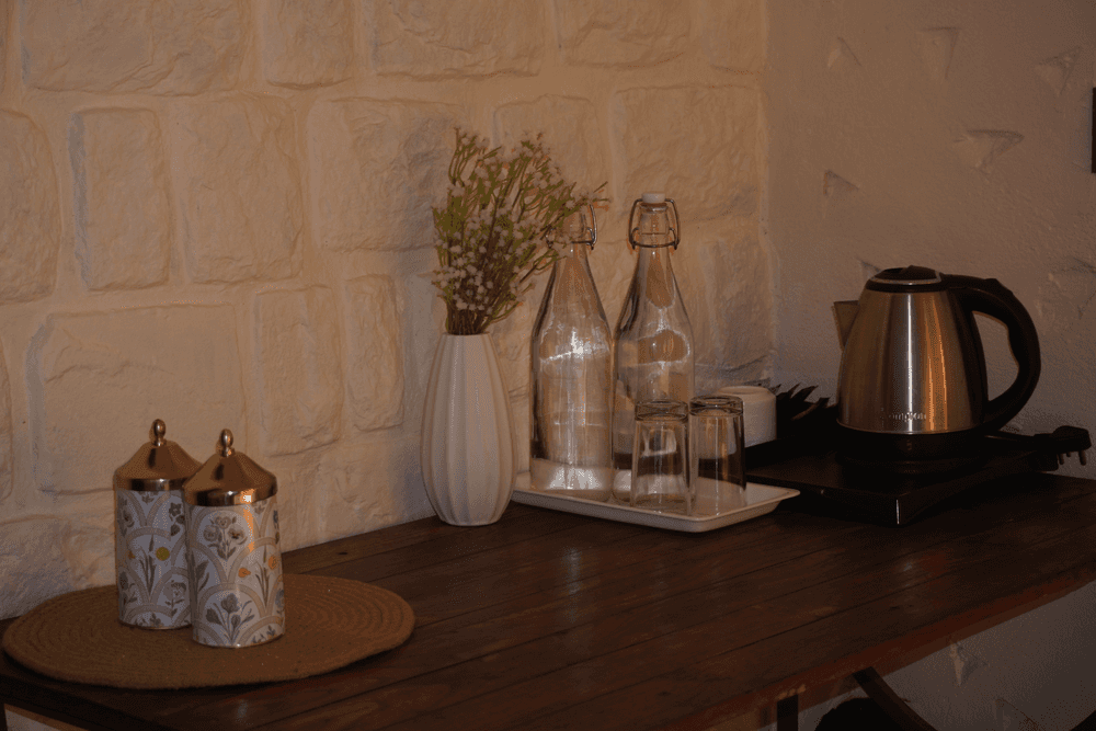 Tea station with kettle and storage jars