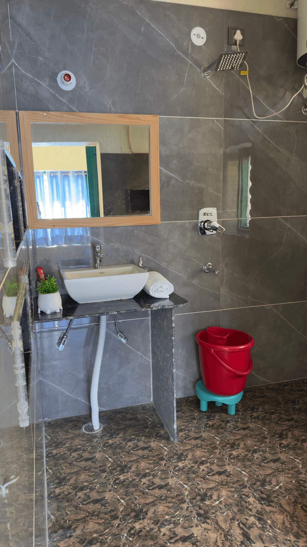 Bathroom washbasin and shower area