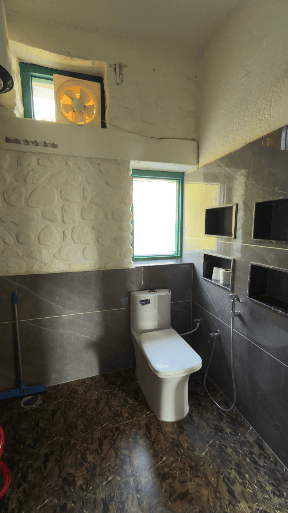 Western toilet in the attached bathroom