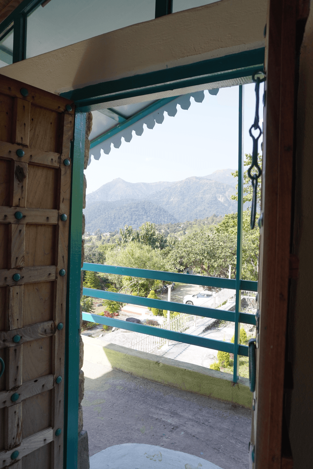 Balcony with railing and mountain view