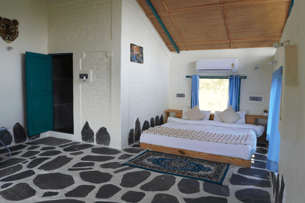 Double bed and stone-inlaid walls